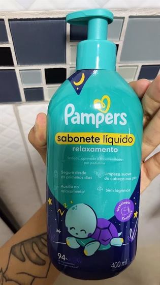 Cliente com o kit Pampers